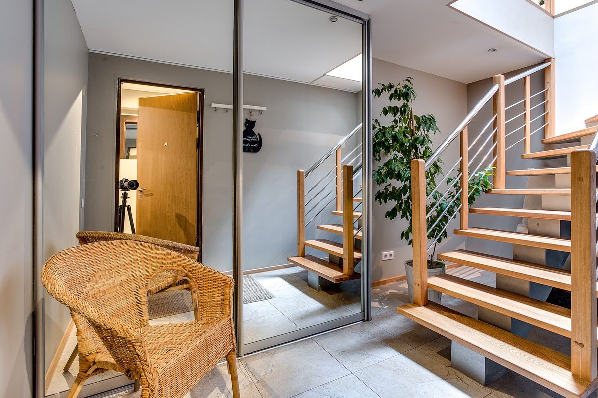 Build fitted storage cupboards under stairs